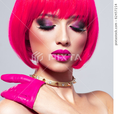 Model with creative colored bob hairstyle. Girl in 62457214