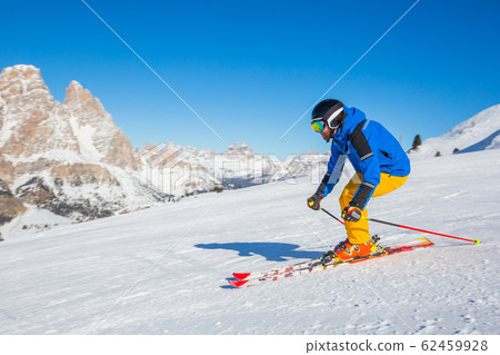 Alpine skier on slope at Cortina 62459928