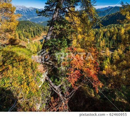 Calm autumn Alps mountain lake with clear Calm autumn Alps mountain lake with clear 62460955