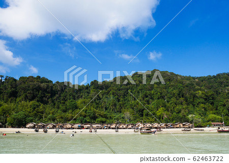 The Moken Sea Gypsy Village at Koh Surin on the Mu Ko Surin National Park, Surin Islands of Thailand. The Moken Sea Gypsy Village at Koh Surin on the Mu Ko Surin National Park, Surin Islands of Thailand. 62463722
