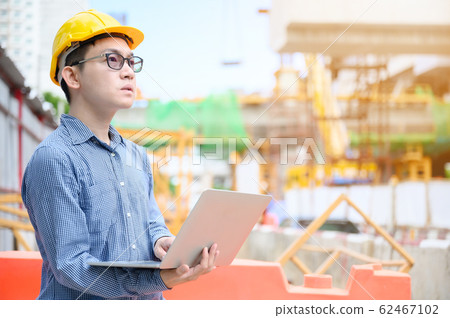 Young asian engineers are working on the construction site 62467102