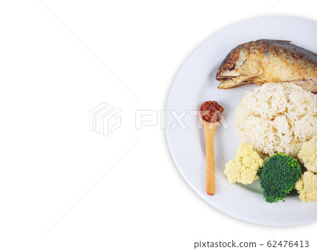 Mackerel fried with chilli sauce Thai style food. Healthy food. Mackerel fish with carrot and broccoli on white flat plate isolated on white background from top view 62476413