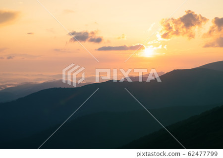 Sunrise, sunset in the Carpathian mountains. Sunrise, sunset in the Carpathian mountains. 62477799