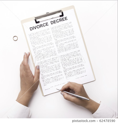 Wife signing separation document isolated on white Wife signing separation document isolated on white 62478590