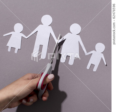 Concept of breaking relations, quarrels, treachery, betrayal on gray Concept of breaking relations, quarrels, treachery, betrayal on gray 62478596