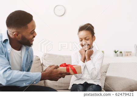 Birthday girl. Dad making gift for daughter Birthday girl. Dad making gift for daughter 62479421