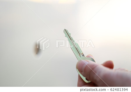 Key (duplicate key spare key passenger car rental car body parts faceless slide door person transfer senior) 62481394