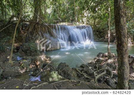 The clean waterfall there is an emerald green The clean waterfall there is an emerald green 62482420