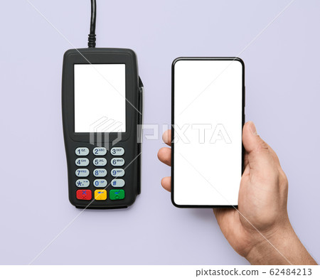 Contactless payment for paying by smartphone with nfc technology Contactless payment for paying by smartphone with nfc technology 62484213