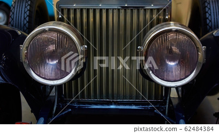 Detail of classic car. Close-up of headlight. 62484384