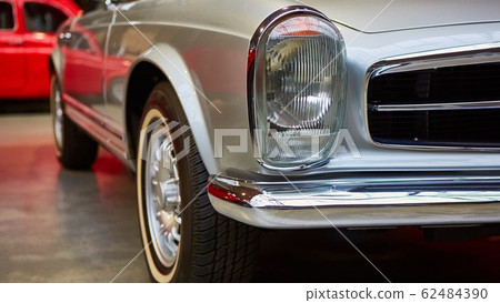 Detail of classic car. Close-up of headlight. 62484390
