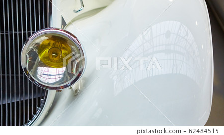 Detail of classic car. Close-up of headlight. Detail of classic car. Close-up of headlight. 62484515