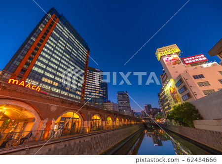 Tokyo cityscape in Japan Overlooking Marchecute and Kanda River from Manseibashi. Night view (backward towards Ochanomizu Station) 62484666