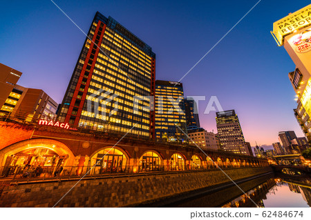 Tokyo cityscape in Japan Overlooking Marchecute and Kanda River from Manseibashi. Night view (backward towards Ochanomizu Station) 62484674