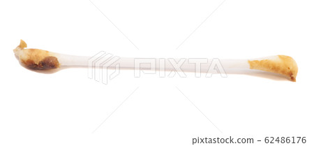 Ear wax on cotton swab isolated on white 62486176
