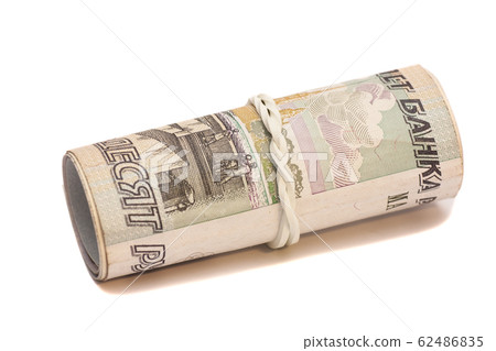 Roll of Russian money with rubber band 62486835