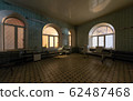 Abandoned hospital room with large semicircular 62487468