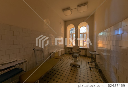 Abandoned gynaecological consulting room in an old 62487469