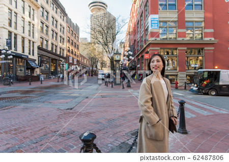 Japanese women strolling through the streets of Canada Japanese women strolling through the streets of Canada 62487806
