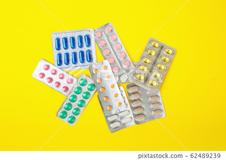 group of pharmaceutical medication and medicine pills in packs 62489239