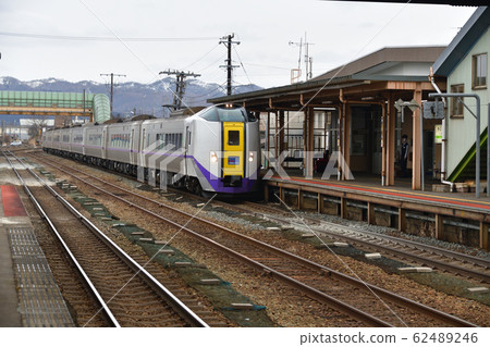Photographing the scenery of the limited express supermarket Hokuto departing from JR Yakumo Station in winter in Yakumo-cho, Hokkaido Photographing the scenery of the limited express supermarket Hokuto departing from JR Yakumo Station in winter in Yakumo-cho, Hokkaido 62489246