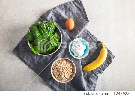 Ingredients for healthy green pancakes Ingredients for healthy green pancakes 62489283