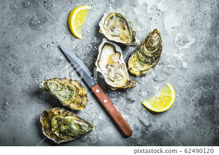 Fresh oysters on ice Fresh oysters on ice 62490120