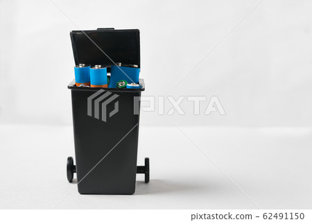 Used batteries in the bin. Collection and 62491150