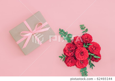 Gift or present box wrapped in kraft paper and Gift or present box wrapped in kraft paper and 62493144