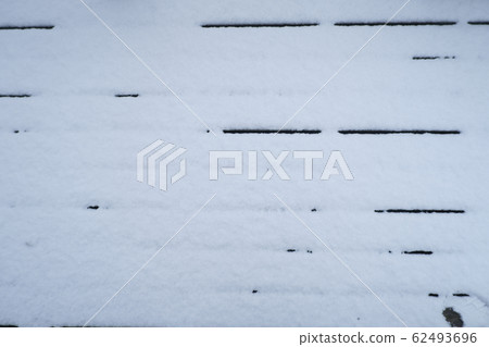Image of snow on the wooden deck Image of snow on the wooden deck 62493696