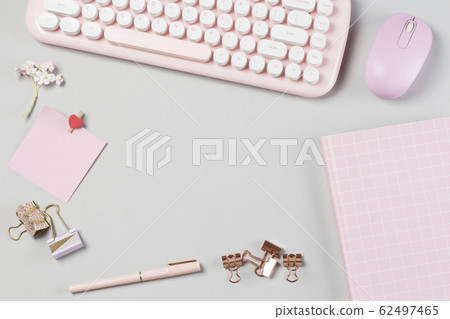 flat lay stationery on work desk in gray pastel background flat lay stationery on work desk in gray pastel background 62497465