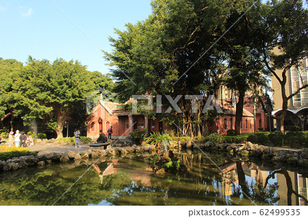 Building with pond Building with pond 62499535