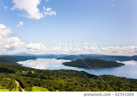 Akan Mashu National Park in August as seen from Bihoro Pass, Eastern Hokkaido, Japan 62501889