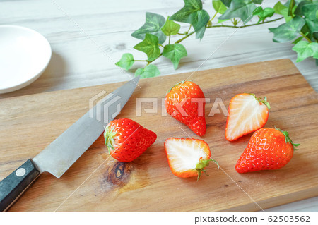 Strawberries in the kitchen. Strawberry on dining table 62503562