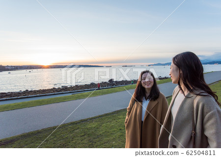 Japanese woman watching the sunset in Canada 62504811