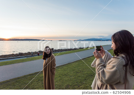 Japanese woman watching the sunset in Canada 62504906