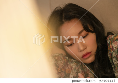 Lifestyle woman relax inside house Lifestyle woman relax inside house 62505331