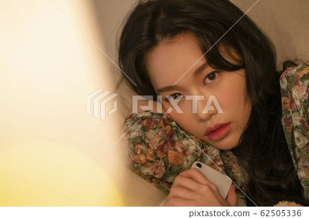 Lifestyle woman relax inside house Lifestyle woman relax inside house 62505336