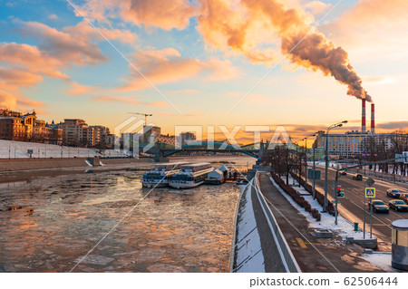 Russia, Moscow- 8 february 2020: panorama ice drift Moscow river on blue dramatic sky background Russia, Moscow- 8 february 2020: panorama ice drift Moscow river on blue dramatic sky background 62506444