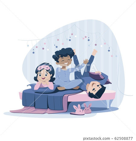 Three cheerful kids of diverse race in blue nightwear lie on the bed, having pajama party. Sleepover and slumber party concept. Print advertisement. 62508877