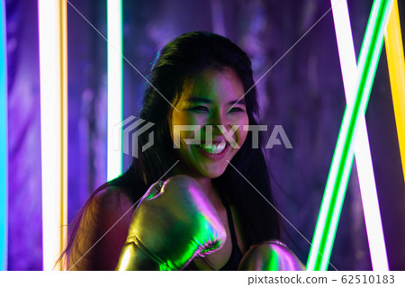 Beautiful Asian Woman is training and punching 62510183