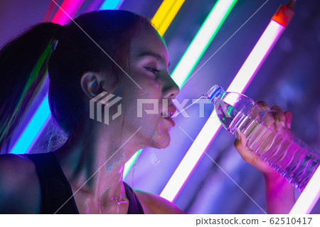 Beautiful 20s Asian Woman finish training in sport Beautiful 20s Asian Woman finish training in sport 62510417