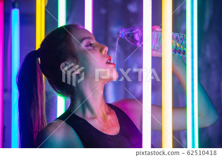 Beautiful 20s Asian Woman finish training in sport Beautiful 20s Asian Woman finish training in sport 62510418