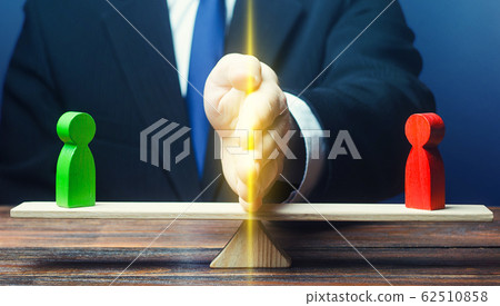 Man divides conflicting sides parties with a hand on scales. Stop hot phase of war, ceasefire fight. Avoidance violence, bullying. protection of witnqesses. Mediator services. Finding a compromise. 62510858