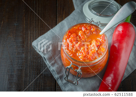 Adjika hot chili pepper sauce paste harissa Adjika hot chili pepper sauce paste harissa 62511588