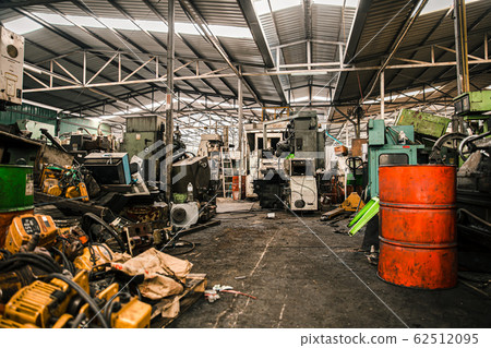 old grunge used machinery workshop garage or heavy machine junkyard warehouse 62512095