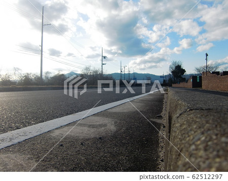 A view of a cityscape with new roads constructed through urban development and blue skies 62512297