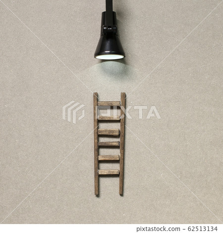 Wooden ladder with lamp light. Development, challenge, success concept 62513134