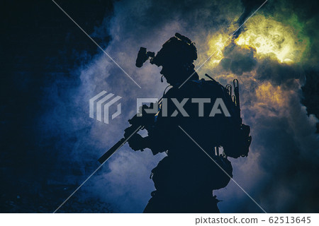 Soldier silhouette on background of fire and smoke 62513645