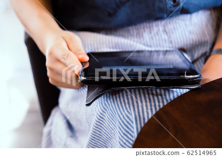 image of people using a digital tablet image of people using a digital tablet 62514965
